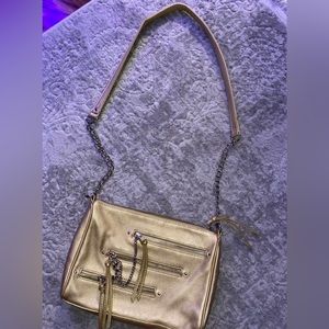 Carlos by Carlos Santana gold  front zipper crossbody purse